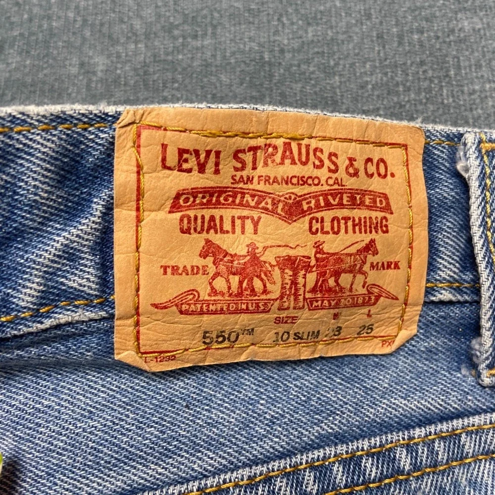 Vintage Levi's 550 Jeans Boys 10 Slim Fit 23x25 Blue Denim Cotton Straight Leg
